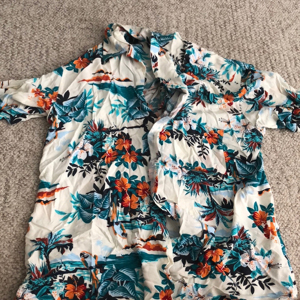 George Hawaii’s shirt.